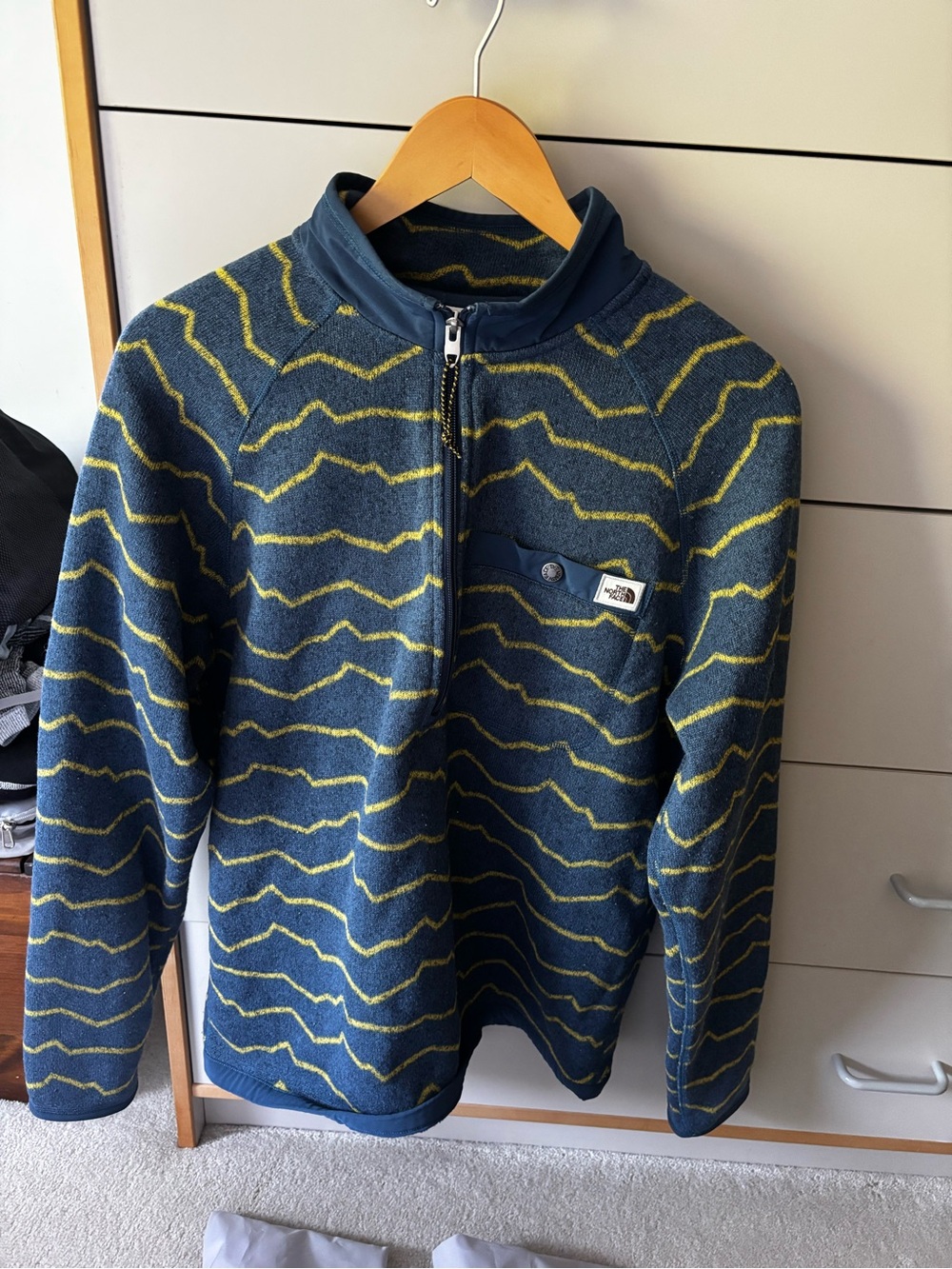 The North Face Men's Navy Fleece Zip-Up with Yellow Wave Pattern